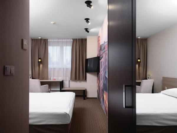 Iness Hotel : photo 4 de la chambre chambre quadruple