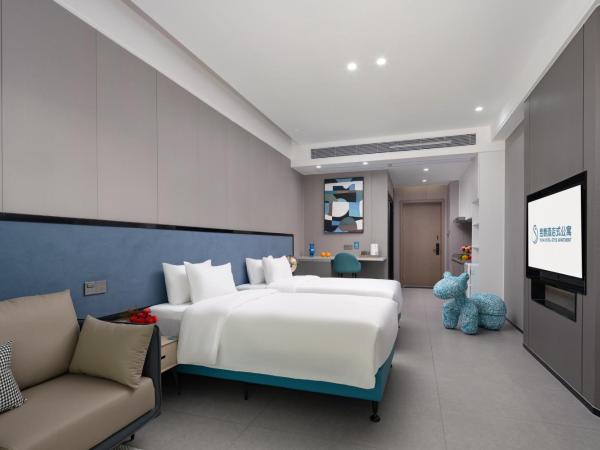 Yutai Hotel Apartment : photo 2 de la chambre chambre lits jumeaux deluxe