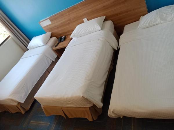 YMCA One Orchard : photo 4 de la chambre chambre triple standard