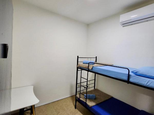 Swanling Kuching : photo 2 de la chambre chambre lits jumeaux avec salle de bains commune