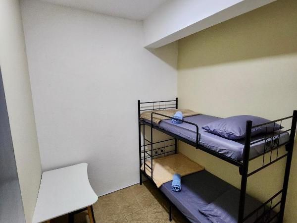 Swanling Kuching : photo 1 de la chambre chambre lits jumeaux avec salle de bains commune
