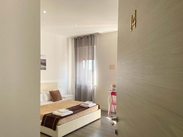 Confortini Rooms SUNDAY : photo 2 de la chambre chambre triple avec balcon