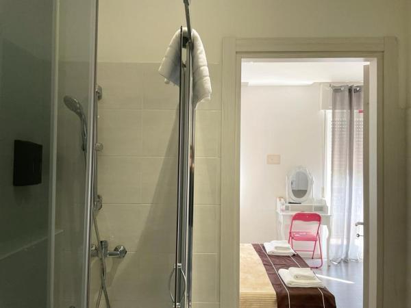 Confortini Rooms SUNDAY : photo 10 de la chambre chambre triple avec balcon