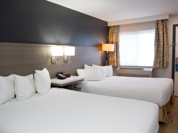 Days Inn by Wyndham Kelowna : photo 1 de la chambre chambre 2 lits queen-size - non-fumeurs