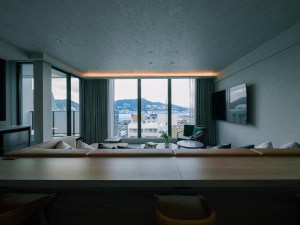 FAV LUX Nagasaki : photo 1 de la chambre suite avec baignoire spa