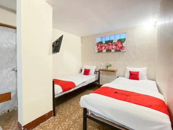 RedDoorz Syariah at Prapen Jaya Surabaya : photo 5 de la chambre chambre lits jumeaux standard