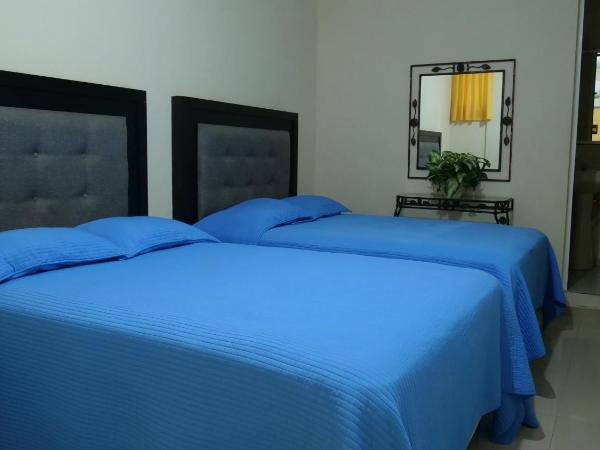 Hotel Mar Caribe Puerto Vallarta : photo 1 de la chambre chambre double supérieure avec deux lits doubles