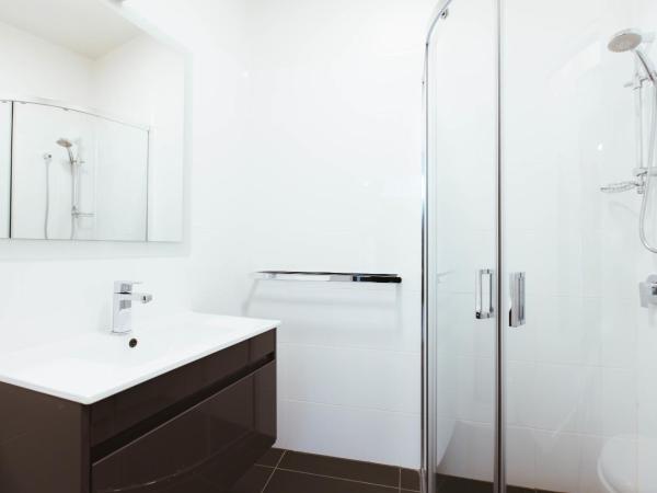 Salamanca Galleria Apartments : photo 7 de la chambre studio lit queen-size