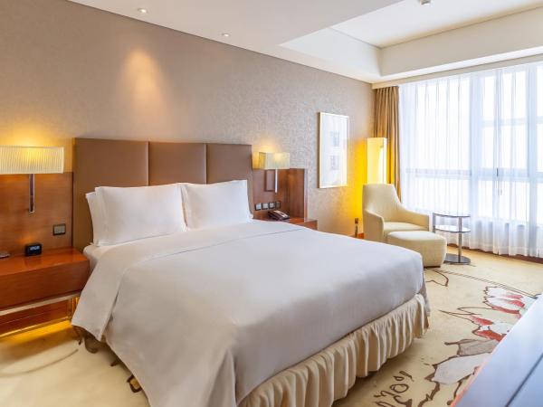 DoubleTree by Hilton Shenyang : photo 3 de la chambre chambre lit king-size pour personnes à mobilité réduite