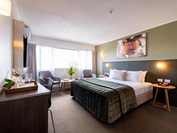 Auckland Rose Park Hotel : photo 1 de la chambre hébergement lit king-size supérieur - vue sur ville et résidences