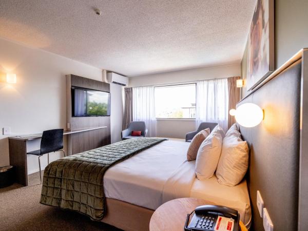 Auckland Rose Park Hotel : photo 2 de la chambre hébergement lit king-size supérieur - vue sur ville et résidences