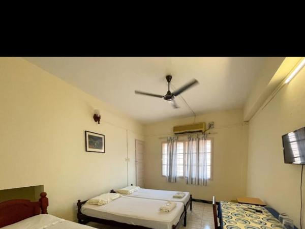 Aambal Residency : photo 1 de la chambre chambre triple