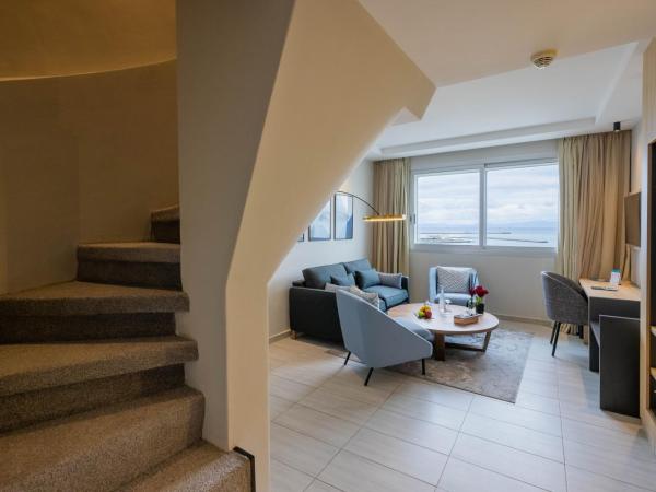 Kenzi Solazur : photo 1 de la chambre duplex familial avec lit king-size