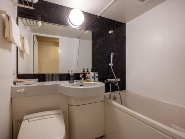 ibis Budget Osaka Umeda : photo 4 de la chambre chambre lits jumeaux standard - non-fumeurs