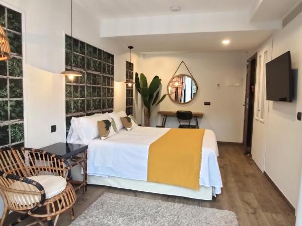 Le Petit Boutique Hotel : photo 9 de la chambre chambre lit queen-size - vue sur jardin