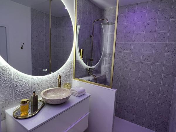 Eaux Spa : photo 2 de la chambre chambre lit queen-size avec baignoire spa