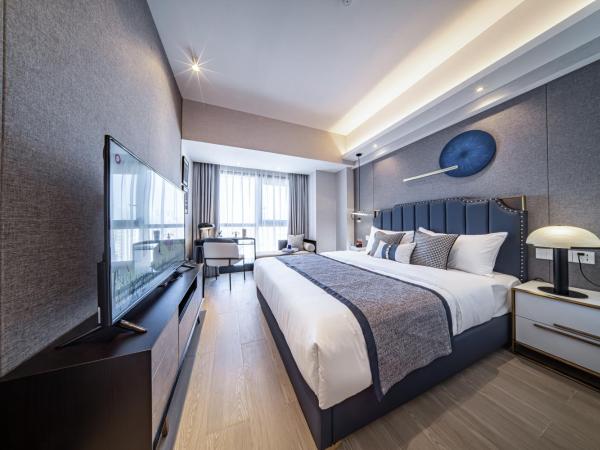 BORUISI Executive Apartment : photo 1 de la chambre chambre exécutive lit queen-size