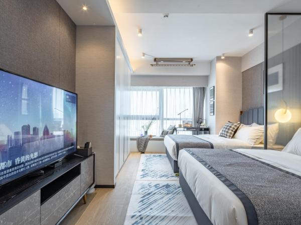 BORUISI Executive Apartment : photo 3 de la chambre chambre lits jumeaux deluxe