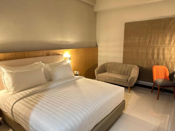 d'primahotel Jemursari Surabaya : photo 1 de la chambre chambre double deluxe