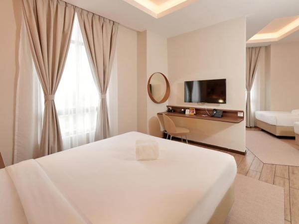 Cititel Express Ipoh : photo 4 de la chambre chambre familiale quadruple