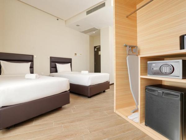 Cititel Express Ipoh : photo 2 de la chambre chambre quadruple deluxe