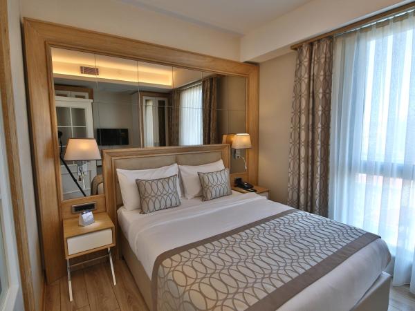 Bof Hotels Ceo Suites Atasehir : photo 9 de la chambre suite lit queen-size