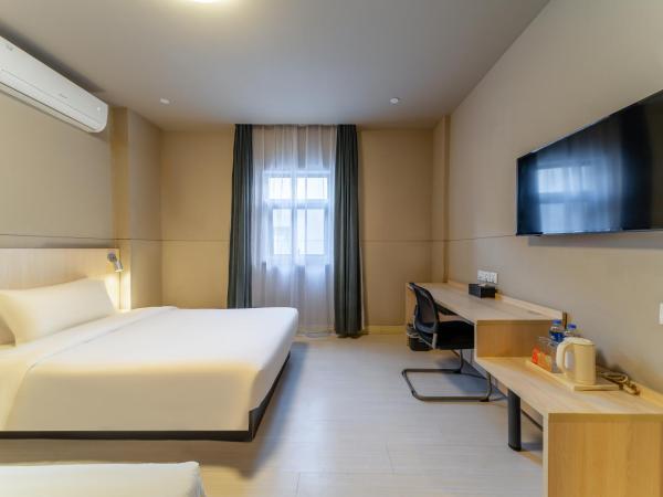 Maixinge Hotel - shuttle bus to Shanghai Pudong International Airport : photo 1 de la chambre chambre lits jumeaux supérieure