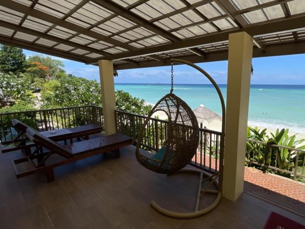 Paradise Pearl Bungalows : photo 3 de la chambre chambre lit queen-size - vue sur mer