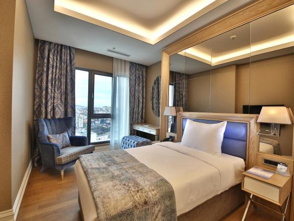 Bof Hotels Ceo Suites Atasehir : photo 7 de la chambre suite lit king-size
