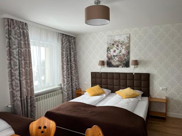 Villa Słonecznego Wzgórza : photo 2 de la chambre chambre triple avec balcon