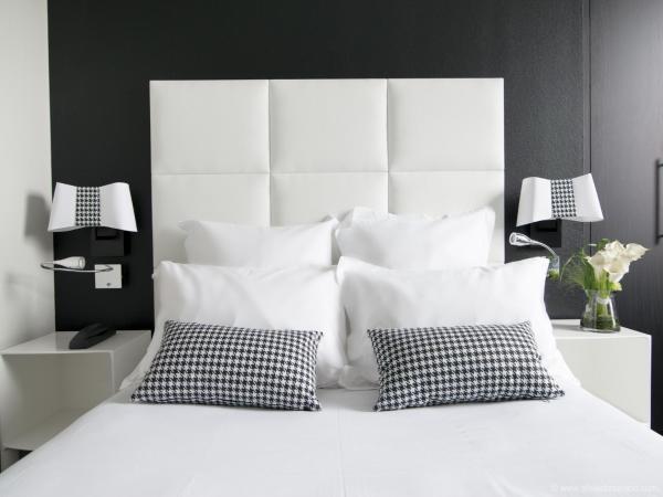 Hotel Restaurant Les Capucins : photo 2 de la chambre chambre lits jumeaux/double exécutive