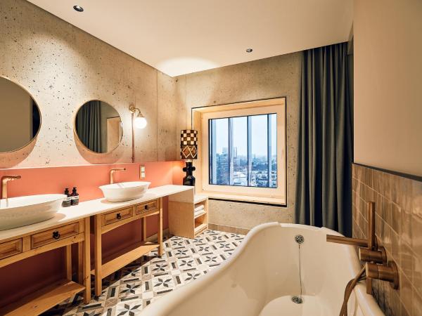 Villa Viva - ein Haus das Brunnen baut : photo 8 de la chambre suite