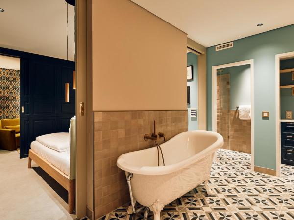 Villa Viva - ein Haus das Brunnen baut : photo 10 de la chambre suite