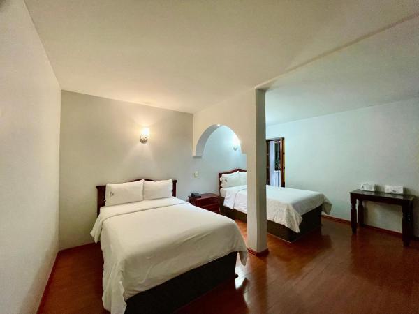 Hotel Puebla Plaza : photo 6 de la chambre chambre triple