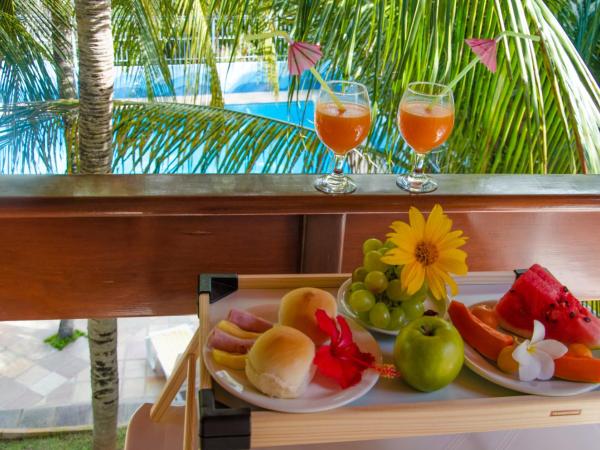 Hotel Tubarão : photo 4 de la chambre chambre quadruple avec balcon