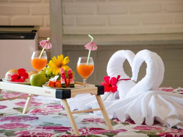 Hotel Tubarão : photo 6 de la chambre chambre quadruple avec balcon