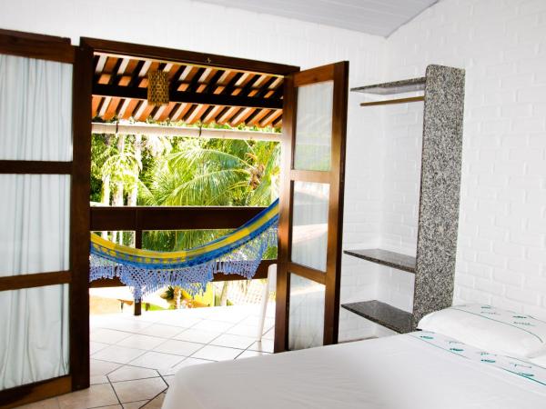 Hotel Tubarão : photo 7 de la chambre chambre quadruple avec balcon