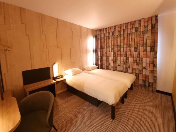 B&B HOTEL Nice Stade Riviera : photo 1 de la chambre chambre lits jumeaux