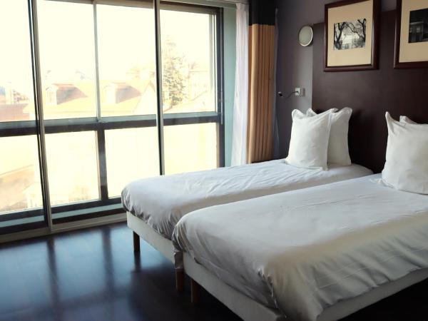 Hôtel Du Centre Annemasse : photo 1 de la chambre chambre lits jumeaux