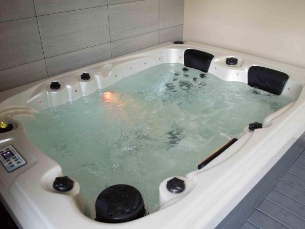 La Pomme d'Amour : photo 3 de la chambre suite avec jacuzzi