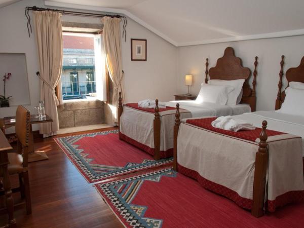 Casa Melo Alvim - by Unlock Hotels : photo 2 de la chambre suite lits jumeaux 