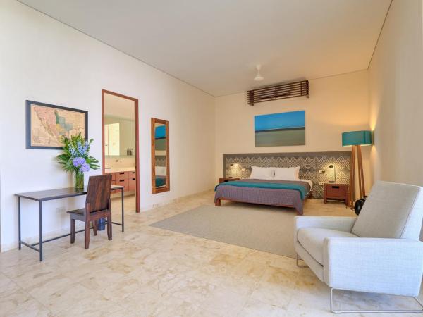 El Pueblo Mérida : photo 1 de la chambre suite deluxe avec lit king-size