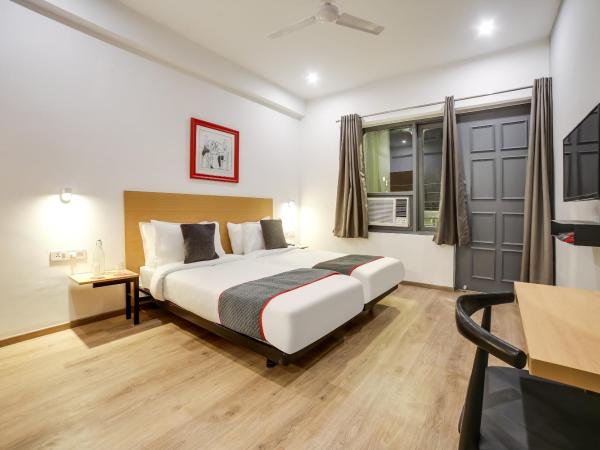Townhouse Unitech Cyber Park Gurgaon Near Omaxe Celebration Mall : photo 1 de la chambre chambre triple classique