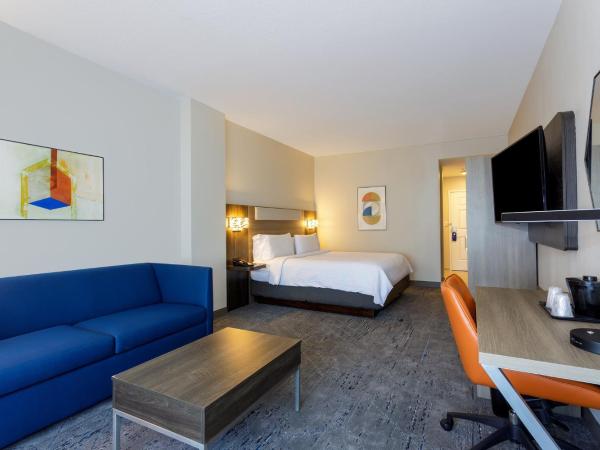 Holiday Inn Express Tampa North Telecom Park, an IHG Hotel : photo 1 de la chambre chambre king standard avec canapé-lit