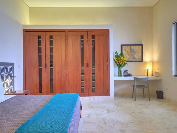 El Pueblo Mérida : photo 2 de la chambre suite deluxe avec lit king-size