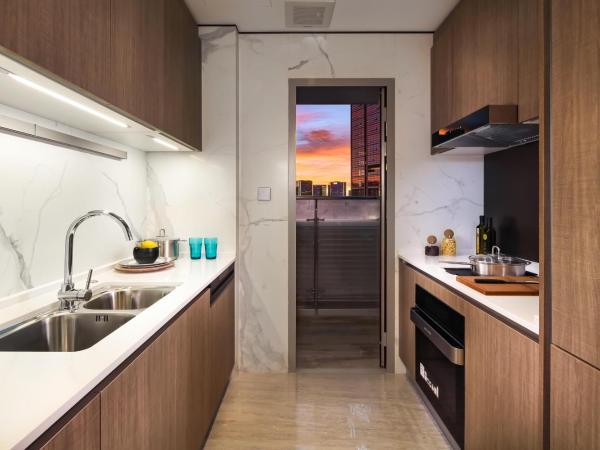 Artisse Place - Access to 4000 sqm Fusion Wellness Centre and 800 sqm Indoor Swimming Pool : photo 7 de la chambre elegant suite with city view (include single breakfast)