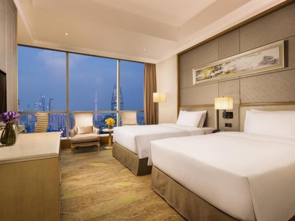 DoubleTree by Hilton Guangzhou-Free Shuttle Bus to Canton Fair Complex & Overseas Buyer Registration Services during Canton Fair Period : photo 3 de la chambre chambre lits jumeaux