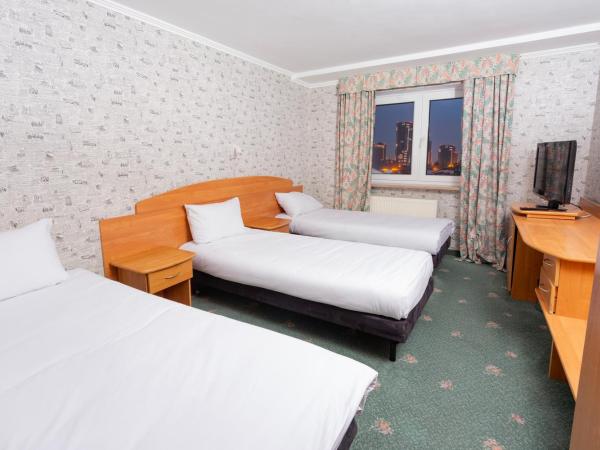 Victory Home Rooms : photo 2 de la chambre chambre triple standard