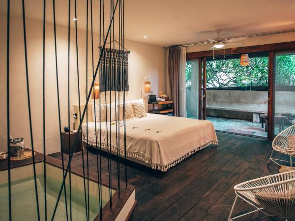 Orchid House Tulum Beach : photo 1 de la chambre suite principale calanthe - vue sur jardin