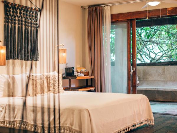 Orchid House Tulum Beach : photo 2 de la chambre suite principale calanthe - vue sur jardin